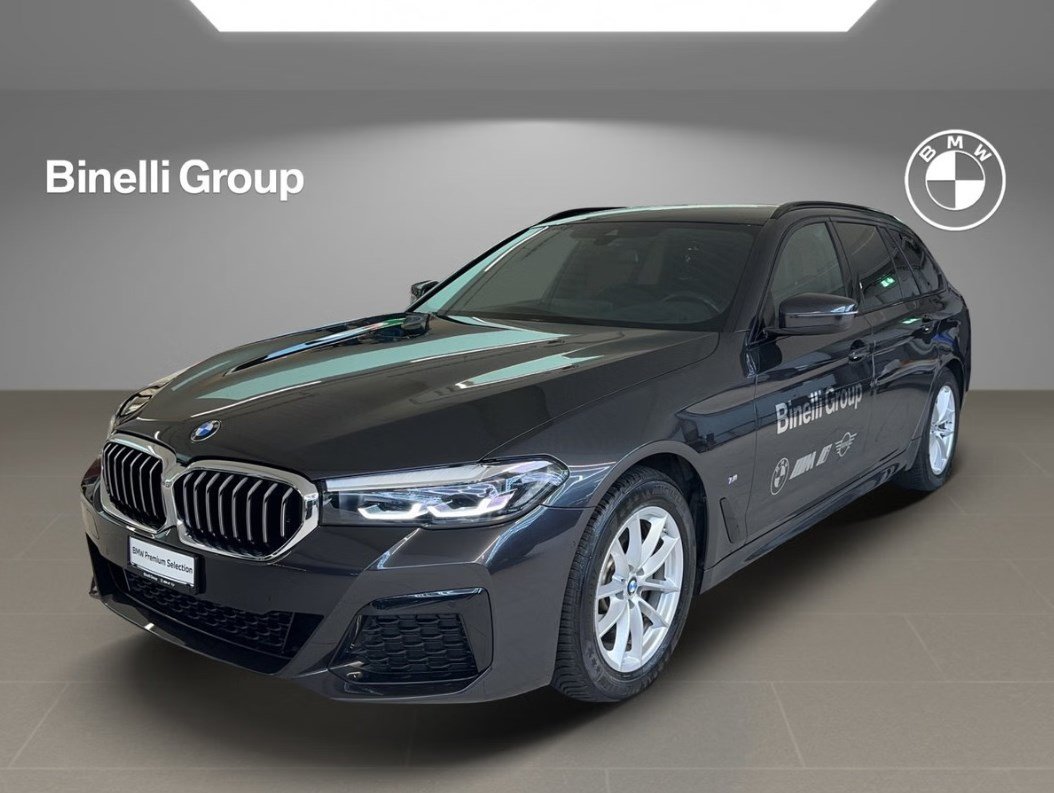 BMW 520d paddles Touring