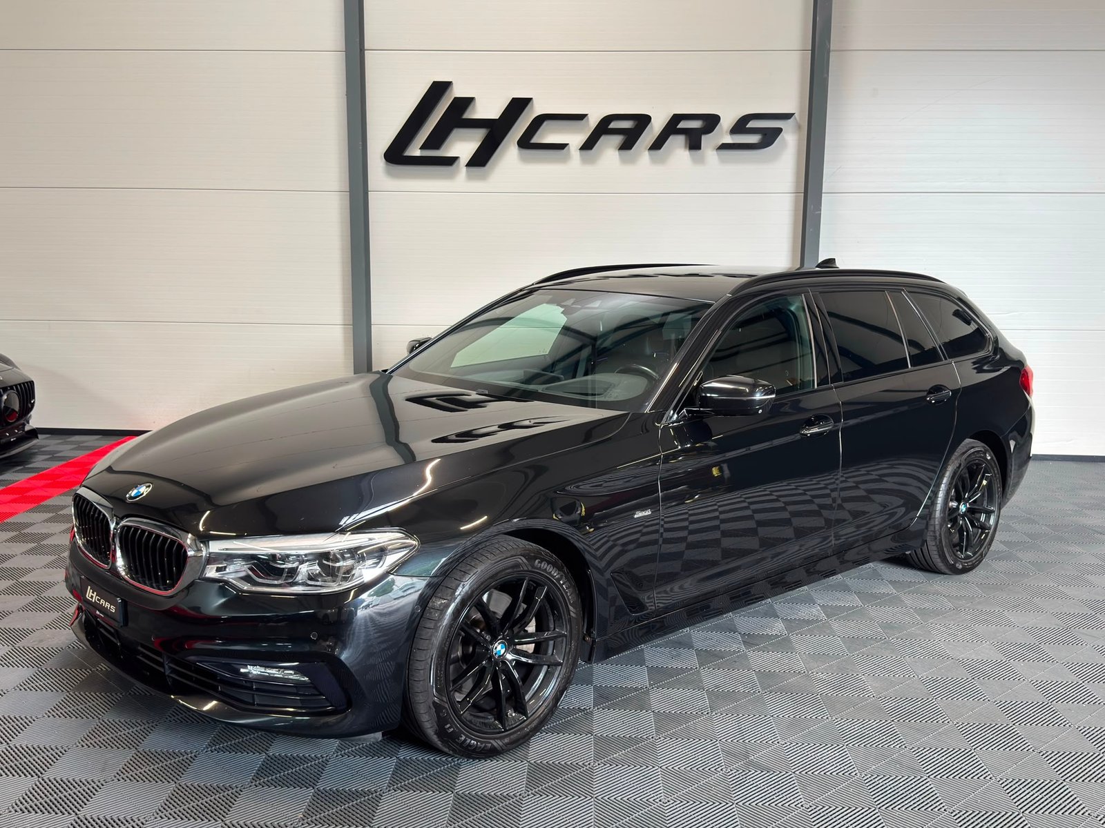 BMW 520d paddles Touring