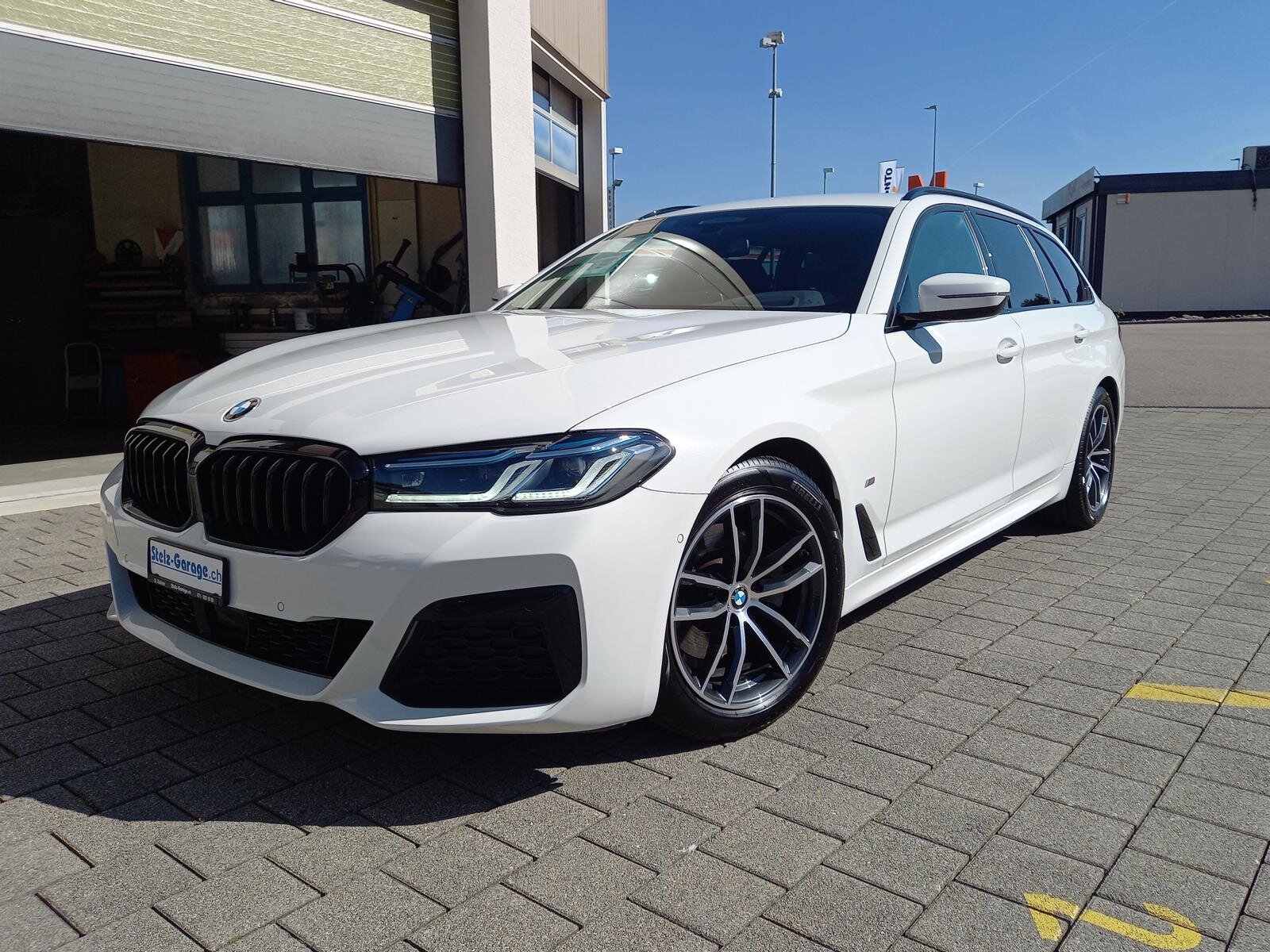 BMW 520d  paddles Touring
