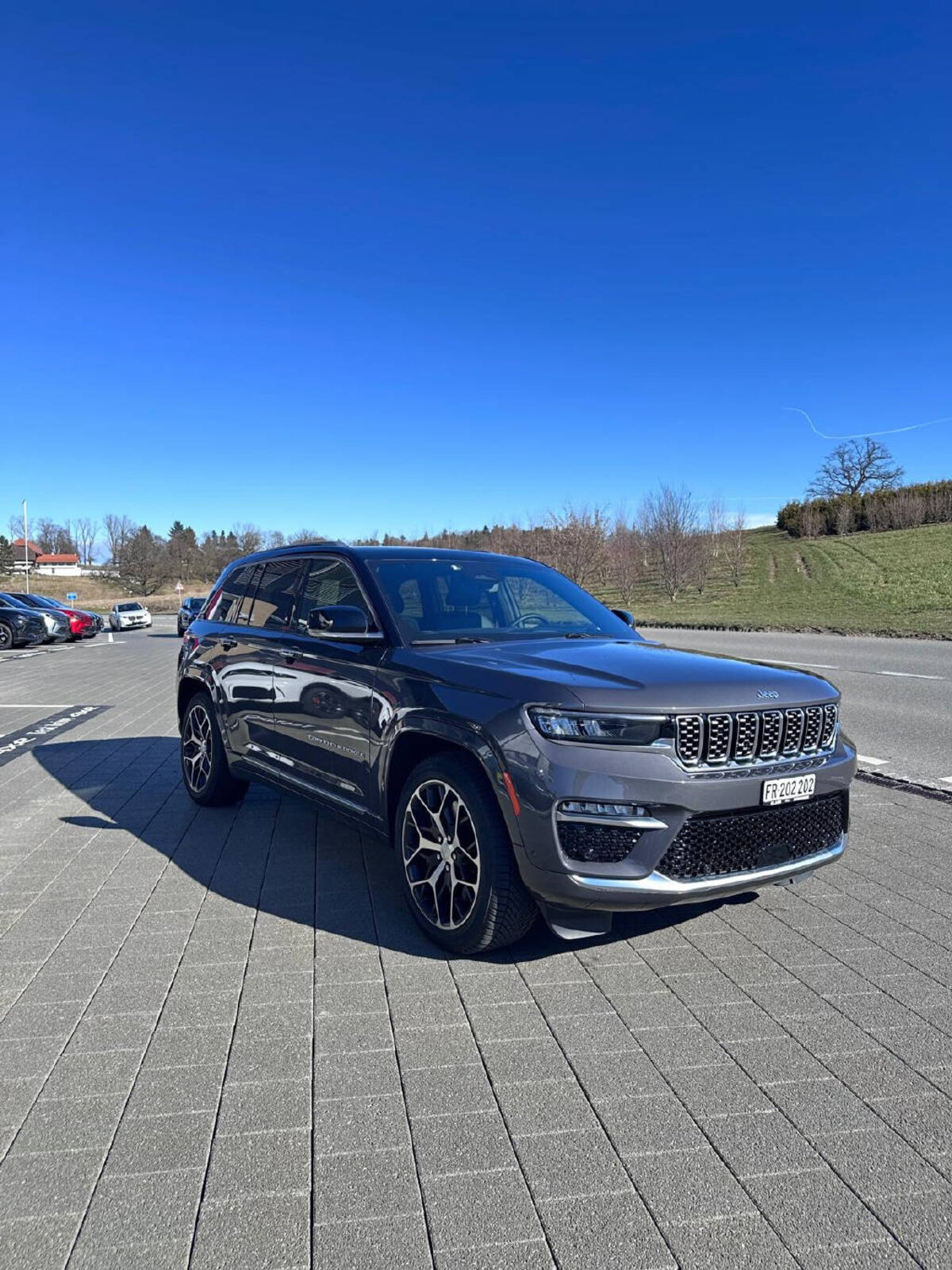 JEEP Grand Cherokee 2.0 Turbo Summit Reserve 4xe, Hybride Rechargeable Essence/Électricité, Occasion / Utilisé, Automatique - 4