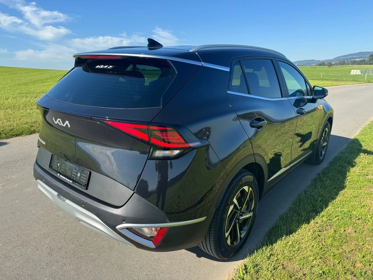 KIA Sportage 1.6T-GDi MHEV Power Edition 4x4, Mild-Hybrid Benzin/Elektro, Occasion / Gebraucht, Handschaltung - 4