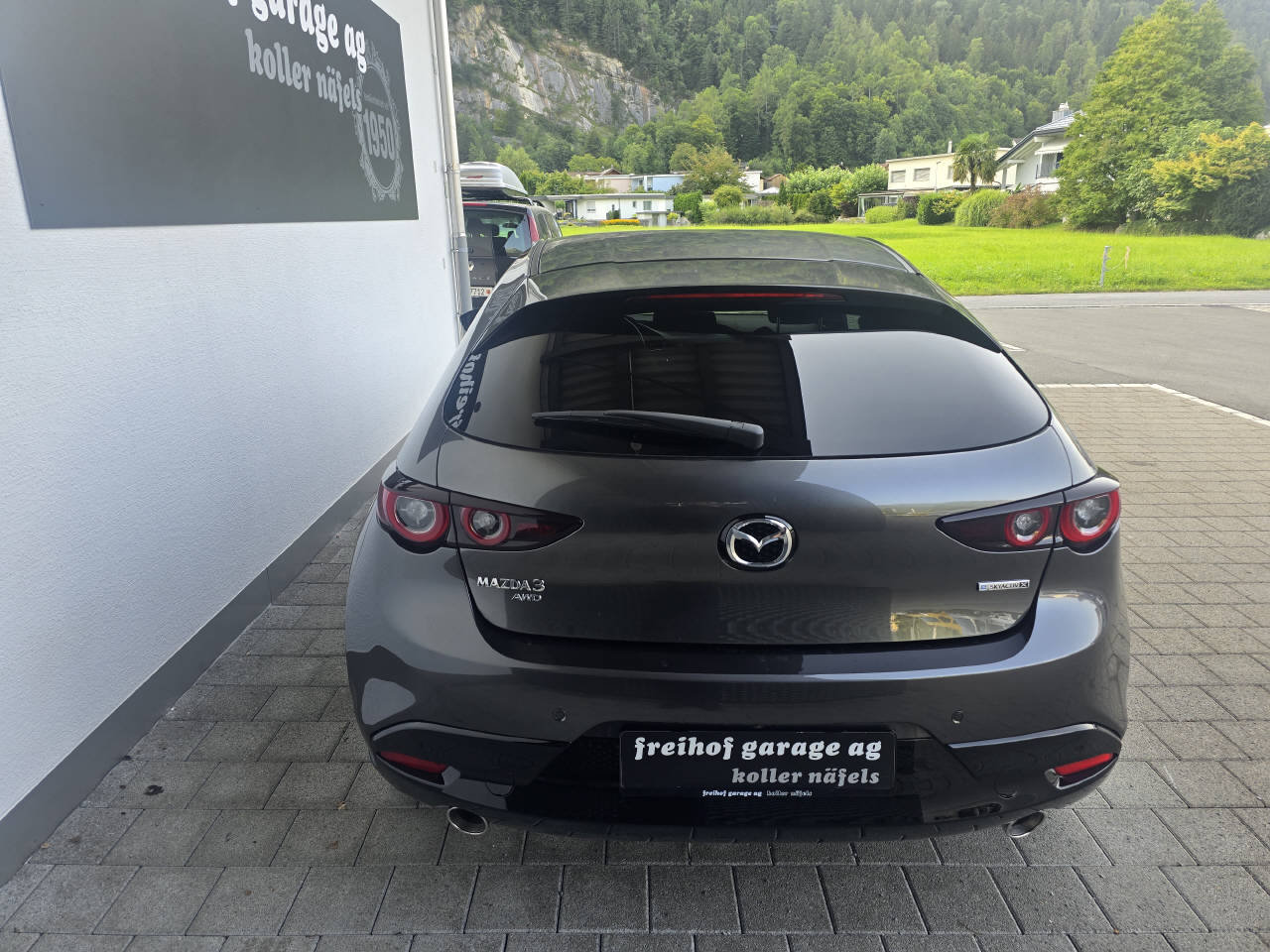 MAZDA 3 Hatchback 2.0 186 Exclusive-Line AWD, Hybride Léger Essence/Électricité, Voiture nouvelle, Automatique - 4